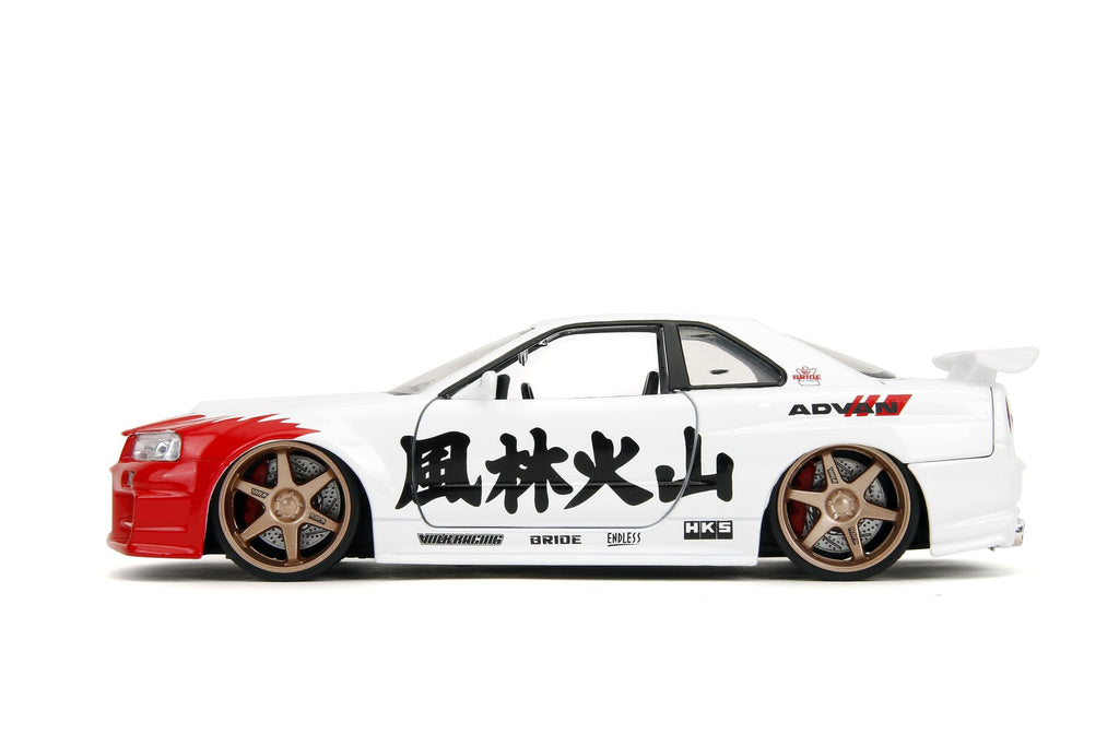Jada Street Fighter 2002 Nissan Skyline GTR with Ryu Figure – 1:24 Scale Die-Cast, Opening Doors, Hood, Trunk, Rubber Tires – Collectible for Adults and Kids – Capcom Licensed