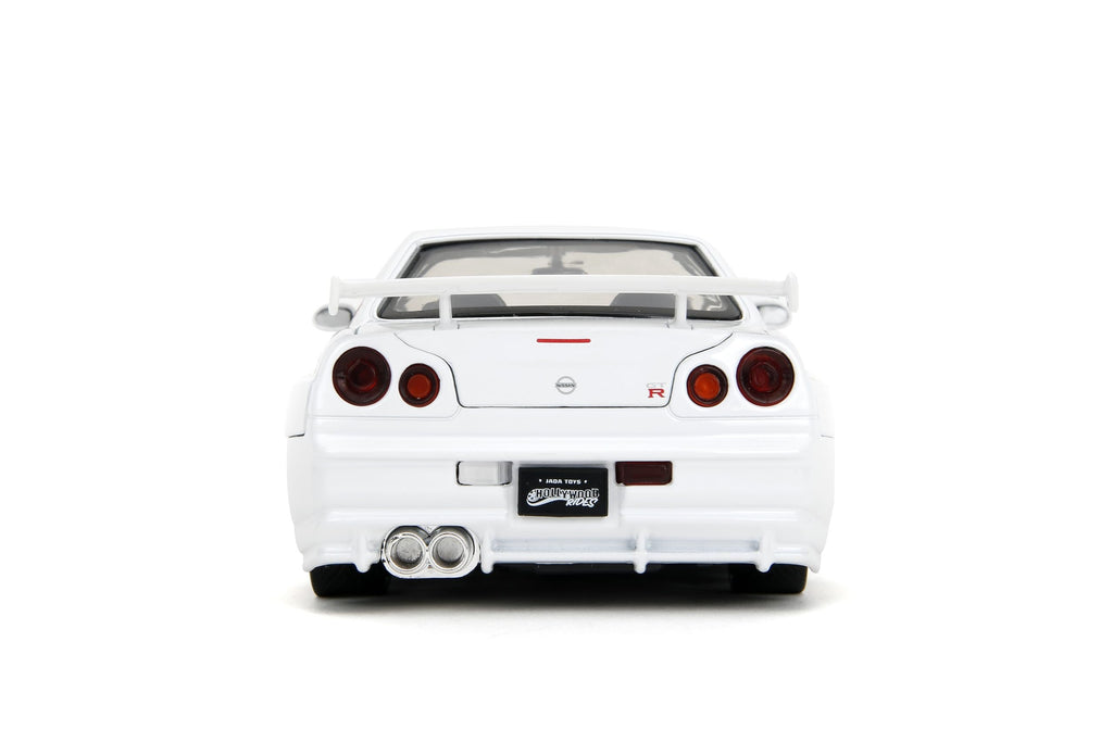 Jada Street Fighter 2002 Nissan Skyline GTR with Ryu Figure – 1:24 Scale Die-Cast, Opening Doors, Hood, Trunk, Rubber Tires – Collectible for Adults and Kids – Capcom Licensed