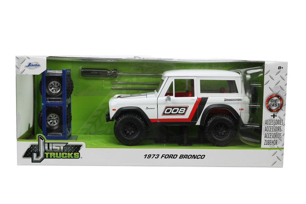 Just Trucks 1:24 1973 Ford Bronco Bridgestone Die-Cast Truck & Tire Rack, Toys for Kids and Adults(White/Red)