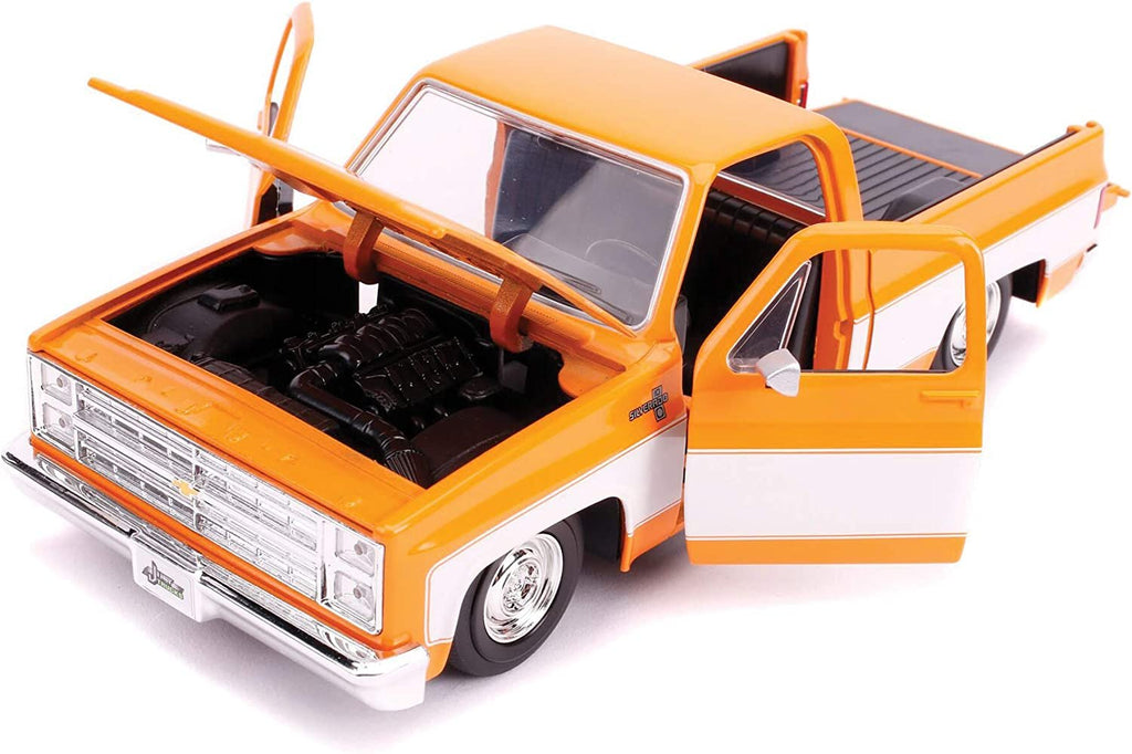 Jada Toys Just Trucks 1:24 1985 Chevrolet C-10 Die-cast Car Orange, Toys for Kids and Adults (31607)