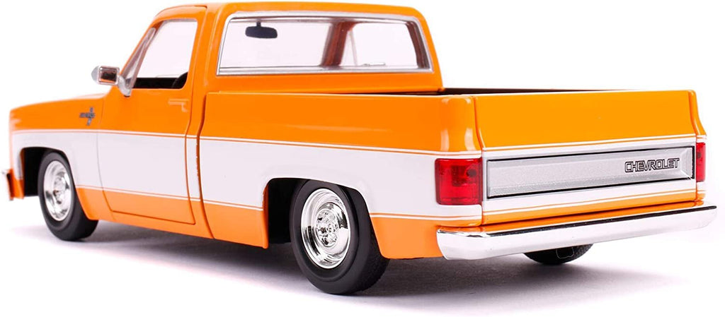 Jada Toys Just Trucks 1:24 1985 Chevrolet C-10 Die-cast Car Orange, Toys for Kids and Adults (31607)